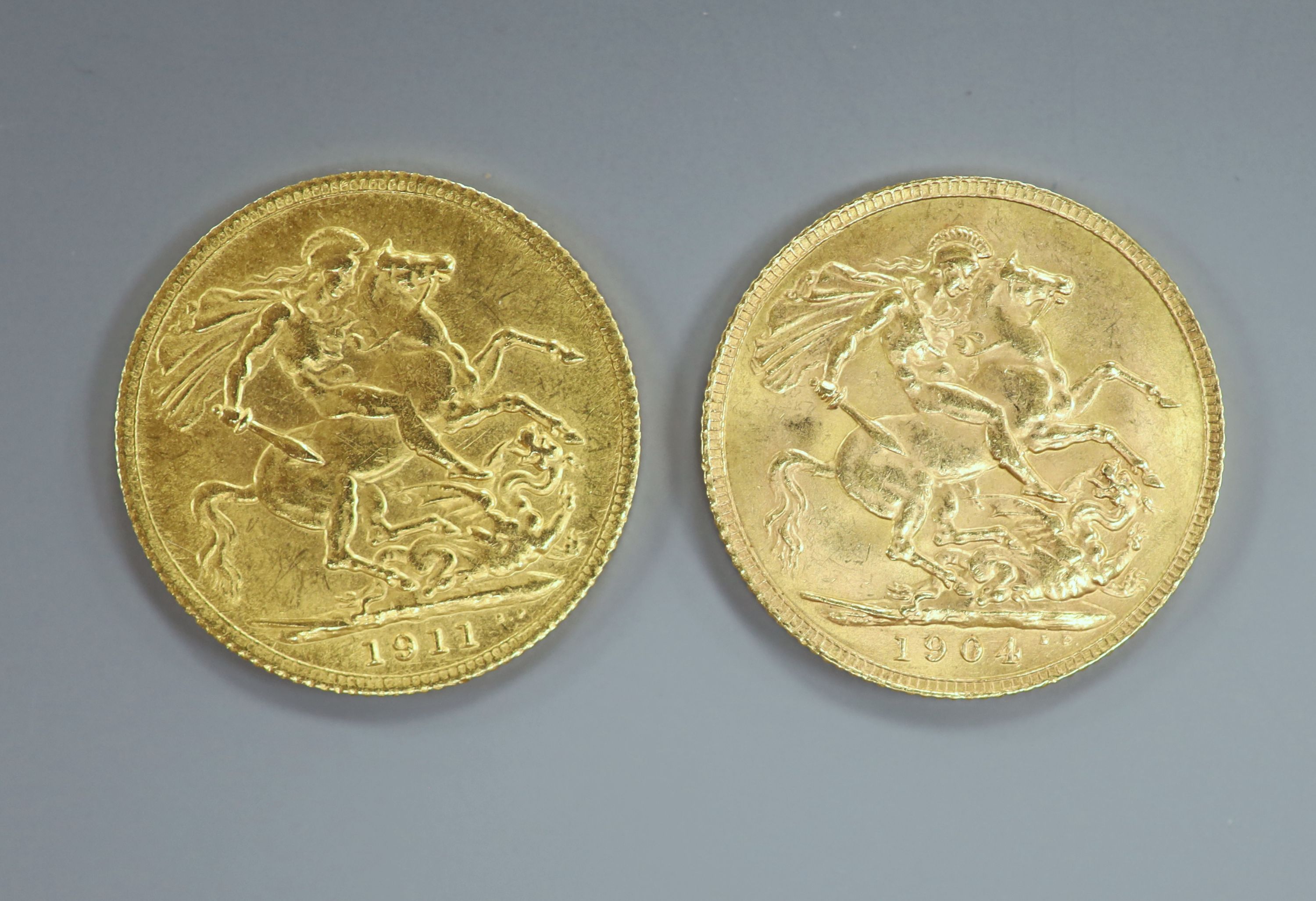 Two gold sovereigns, 1904 & 1911.